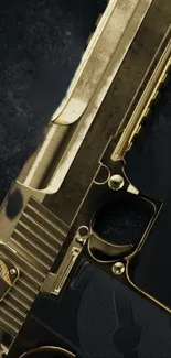 Stylish mobile wallpaper featuring a golden gun design on a dark background.