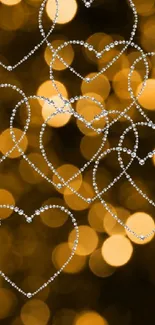 Golden heart bokeh mobile wallpaper with elegant light effect.