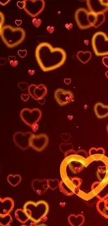 Vibrant mobile wallpaper with glowing golden hearts on a deep red background.