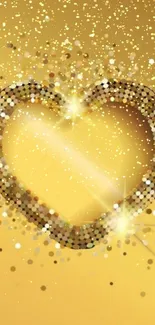 Golden heart with sparkles on yellow background wallpaper.