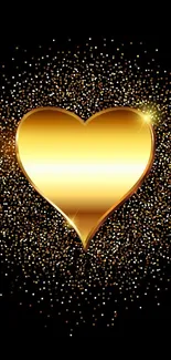 Golden heart with sparkles on black background.