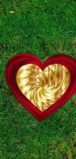 Golden heart surrounded by lush green grass.