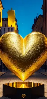 Golden heart sculpture glowing in urban street setting.