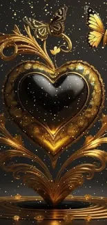 Gold heart ornament with butterflies on dark background.