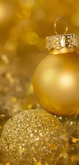 Golden ornaments with glittery details for a festive holiday feel.