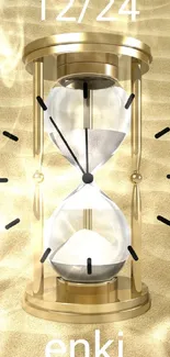 Elegant golden hourglass on sandy background with date and time details.