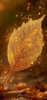 Golden leaf with sparkling effect in autumn background.