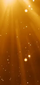 Golden light burst wallpaper with sparkling particles.