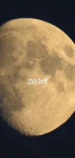 Golden moon against black sky wallpaper.