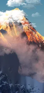 Golden mountain peak with clouds at sunset, creating a serene natural wallpaper.