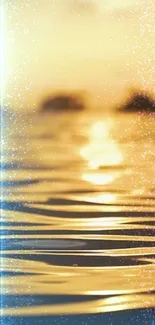 Golden ocean with shimmering water at sunset, creating a serene mobile wallpaper.