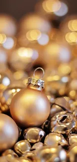 Close-up of golden Christmas ornaments with a beautiful bokeh effect.