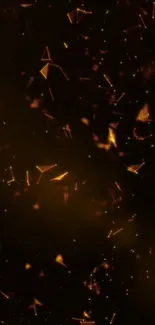 Abstract wallpaper with golden particles on a dark background.