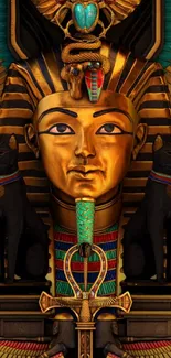 Golden pharaoh head with Egyptian motifs and black cats on a mobile wallpaper backdrop.