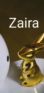 Golden rabbit figurine on a minimalist background.