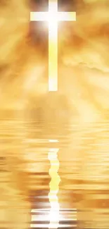 Golden cross reflecting on water with glowing light above.