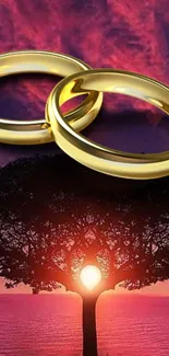 Golden rings over sunset-lit tree in vibrant wallpaper.