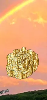 Golden rose on sunset sky with rainbow.