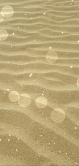 Golden sand texture with sparkling pattern on mobile wallpaper.