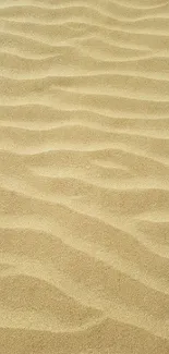 Golden sand waves creating a textured, serene mobile wallpaper design.