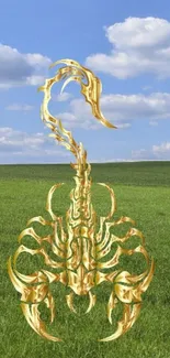 Golden scorpion design on green grass field under blue sky.