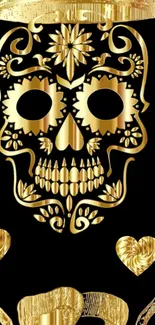 Elegant black and gold skull with floral design on mobile wallpaper.