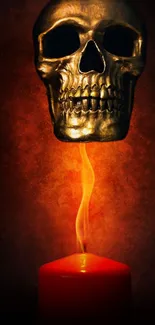 Golden skull floating above a red candle with dark background.