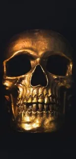 Golden skull wallpaper with dark background.