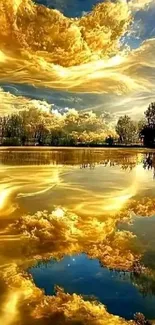 Golden clouds reflecting on a tranquil lake under a vivid sky.