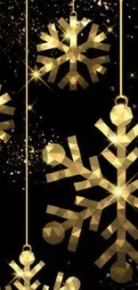 Stylish mobile wallpaper with golden snowflakes on a black background.