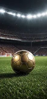 Golden soccer ball on a stadium field under bright lights.