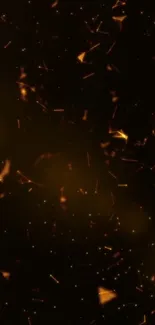 Abstract wallpaper with glowing orange particles on black background.