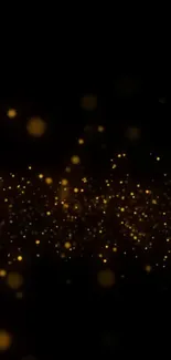 Golden sparkle abstract wallpaper with glowing dots on black background.