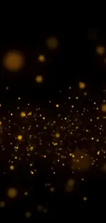 Golden sparkle abstract wallpaper with dark background of glowing particles.