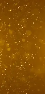 Golden sparkle background with shimmering particles.