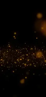 Golden sparkle night wallpaper with glowing specks on a dark background.