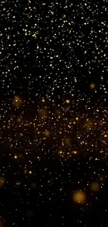 Golden glitter particles on black background, creating an elegant night scene.