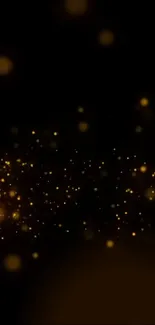 Elegant gold sparkle wallpaper with glowing particles on black background.