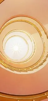 Golden spiral staircase with sunlit center and elegant design.