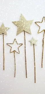 Golden stars on white background wallpaper.