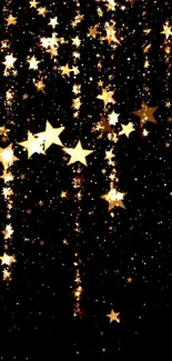 Golden stars on a black night sky background, creating an elegant and cosmic look.