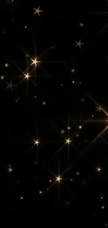 Golden stars on a black background wallpaper.