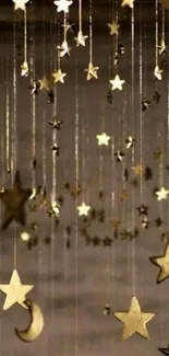 Golden stars hanging in a dark backdrop, creating a celestial mobile wallpaper.