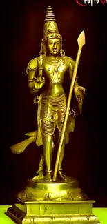 Golden statue wallpaper with intricate spiritual design, ideal for mobile screens.