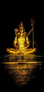 Golden statue on black background mobile wallpaper