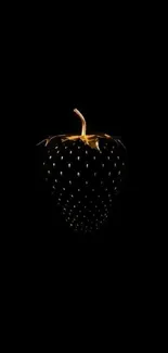 Golden strawberry on a black background, perfect for an elegant mobile wallpaper.