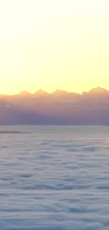 Golden sunrise over clouds, serene mobile wallpaper.