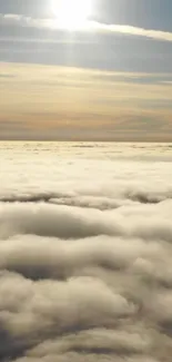 Serene view of golden sunrise over fluffy clouds.