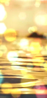 Golden bokeh wallpaper with sunset reflections and soft ripples.