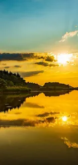 Golden sunset reflecting over a tranquil lake.